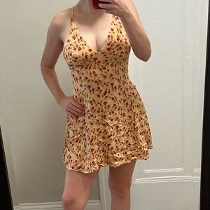 Yellow floral mini sundress from Urban Outfitters